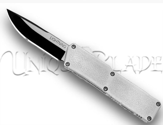 Lightning White OTF Automatic Knife - Two-Tone Plain - Pure Elegance in Action - This OTF automatic knife, in pristine white, boasts a two-tone plain blade, offering a perfect blend of sophistication and cutting precision.